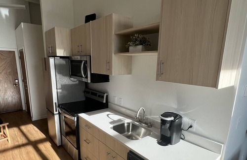 Jonesboro Apartment | Convenient loft with gated parking & 24/7 gym