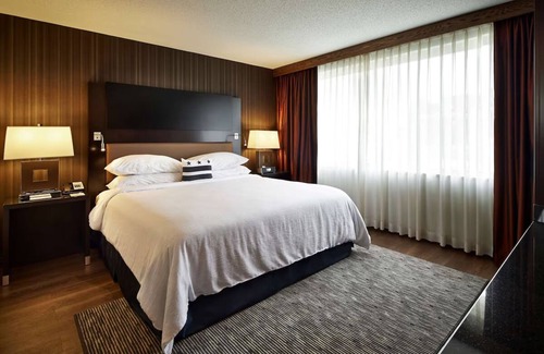 Friendship Heights Hotel | Convenient Metro Access | Modern Accommodations | Pool | 4 Units