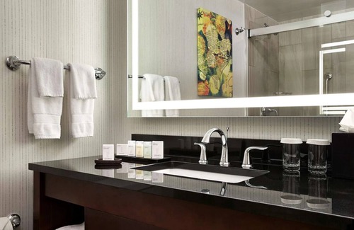 Friendship Heights Hotel | Convenient Metro Access | Modern Accommodations | Pool | 4 Units