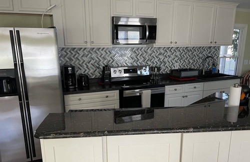 Fuquay-Varina House | Conveniently located home with large enclosed porch