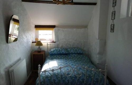 Mawr House | Converted rural stone cottage, Swansea
