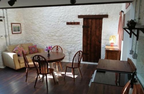 Mawr House | Converted rural stone cottage, Swansea