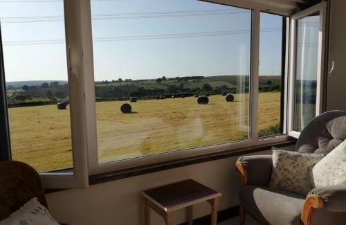 Mawr House | Converted rural stone cottage, Swansea