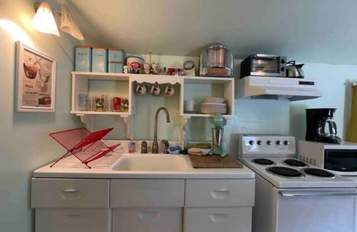 Niagara Falls Apartment | Cool, retro inspired apartment, full of atomic decor! 5 minute walk to the falls