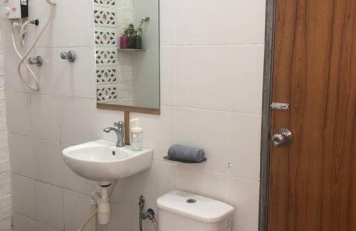 Air Hangat Villa | Coral Back Door One Bedroom House