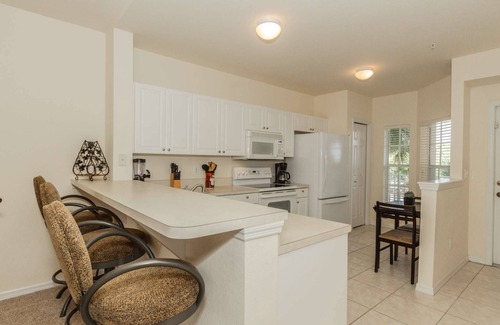 Ole Condo | Coral Falls 3rd flr. condo w/incredible pool views from private screened lanai (bldg. w/elevator)