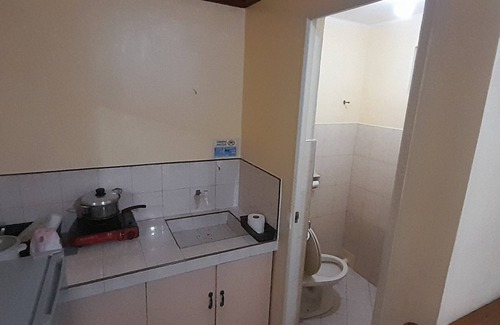Balabag Apartment | Coralyn's Place small room with private toilet and kitchenette