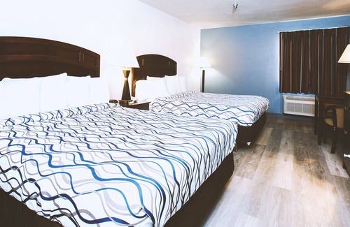 Park City House | Coratel Inn & Suites by Jasper Park City - Wichita North - DQBNS