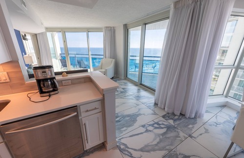 Downtown Myrtle Beach Condo | Corner condo w/180° ocean views & pools