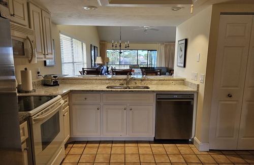 Biggar Condo | Corner condo with golf course views in The Forest