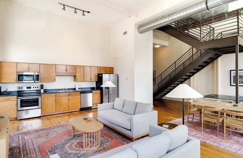 Downtown Louisville Apartment | Corner Loft in Historic Building on Whiskey Row