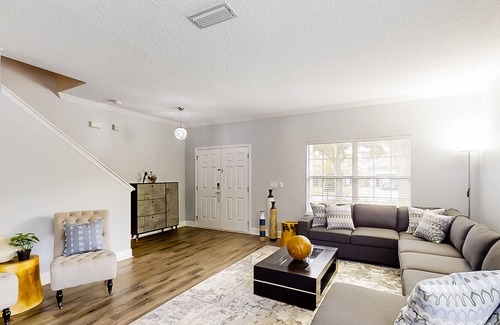 Doctors Inlet House | Corner-lot home with fenced yard, game room, screened lanai, & golf