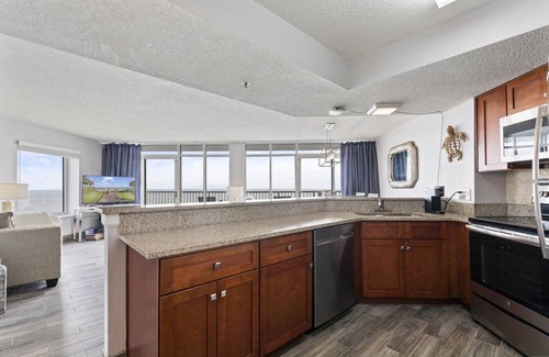 Arcadian Shores Condo | CORNER PENTHOUSE Ocean FRONT unit at Sea Watch Resort; REDUCED FALL RATES!