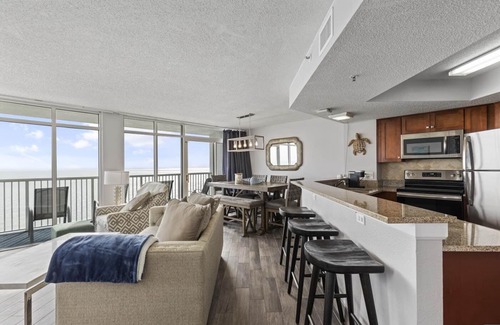 Arcadian Shores Condo | CORNER PENTHOUSE Ocean FRONT unit at Sea Watch Resort; REDUCED FALL RATES!