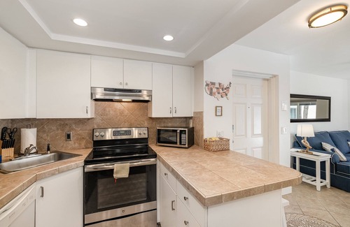 Port Canaveral Condo | Corner unit private balcony ocean view, pool & spa, beachfront access in Florida