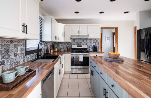 Kentwood House | "Corporate Elegance: Luxe Home in Grand Rapids (no basement)"