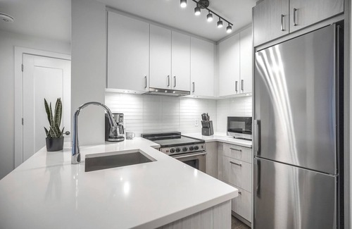 Bay Cloverhill Apartment | Corporate Stays - Amazing 1BR Apartment with Modern Amenities and Prime Comfort