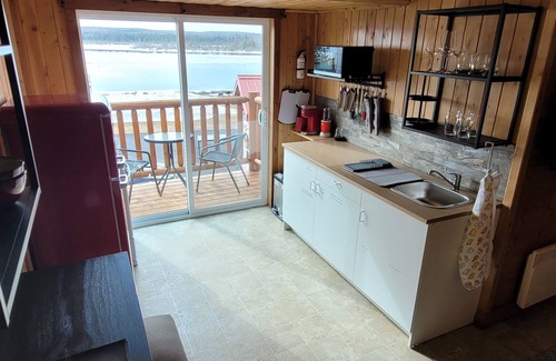 Acadian Peninsula Apartment | Costa Del Sol Apt with Panoramic Pokemouche River view, and swimming off dock.n