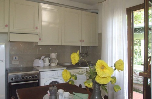 Val Canina Apartment | Cosy apartment for 4 guests with WIFI, pool, TV, patio and parking