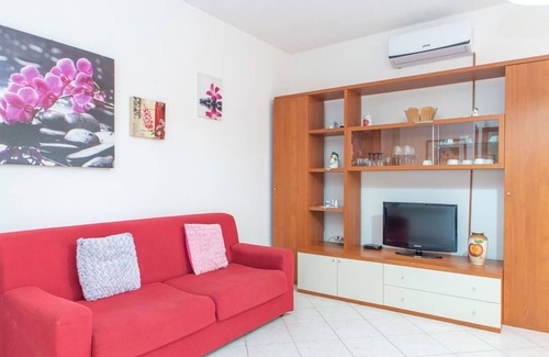 Telti Apartment | Cosy apartment for 8 people with A/C, WIFI, pool, TV, patio, pets allowed and parking