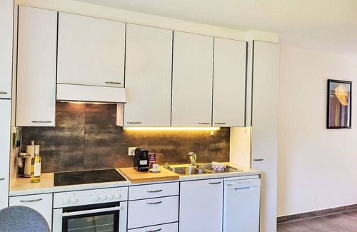 Caslano Apartment | Cosy apartment for 4 people with TV, patio, pets allowed and parking