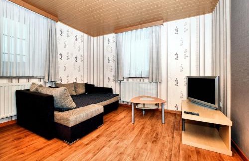 Amel Apartment | Cosy Apartment in Born with Terrace and Garden