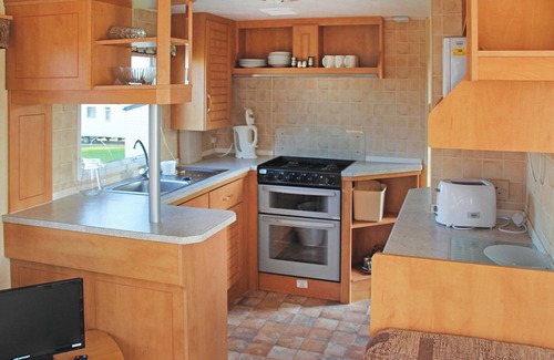 Sandown House | Cosy caravan with one double and one twin.