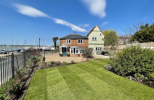 West Mersea House | Cosy Coastal 2-Bedroom Cottage with Hot Tub & Log Burner
