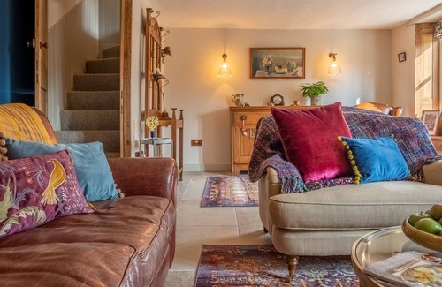 Litcham House | Cosy, comfortable, crammed full of character and presented to charming perfection, Ember Cottage is