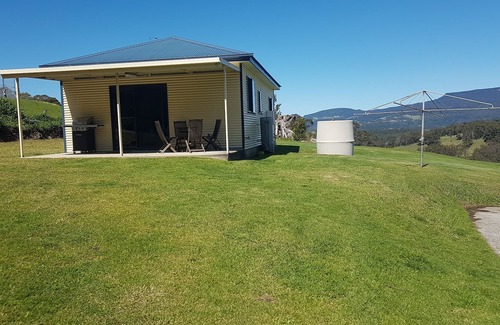 Curramore Cottage | Cosy Cottage on Rainforest acreage with Waterfall