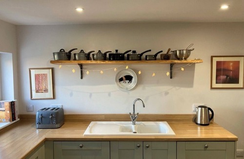 Oldshoremore Cottage | Cosy cottage with garden, just a five minute walk from stunning Polin beach