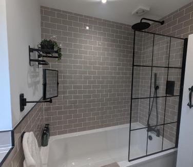 Kendal House | Cosy country cottage with log fireplace and views