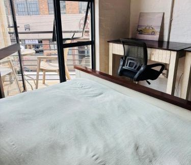 Downtown Johannesburg Apartment | Cosy escape Balcony High speed WiFi Amenities