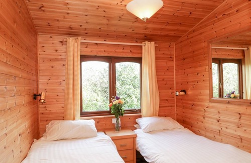 New Forest District Cabin | Cosy Log Cabin - very quiet part of Shorefields Park near Fishing Lake