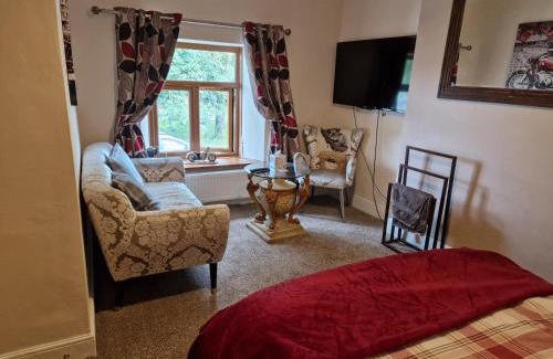 Llanwrda House | Cosy Riverside home