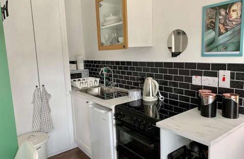 Killybegs House | Cosy Studio Cabin set in nature with stove