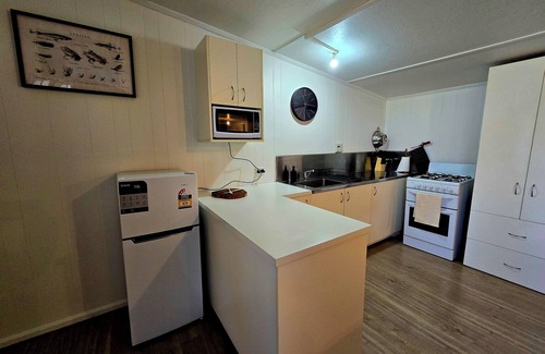 Doctors Point Cabin | Cosy water view cabin in amongst the pristene wilderness of Central Highlands