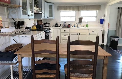 Floral City Cottage | Cottage at Water's Edge 2 Bedroom with dock, covered deck, WiFi, AC