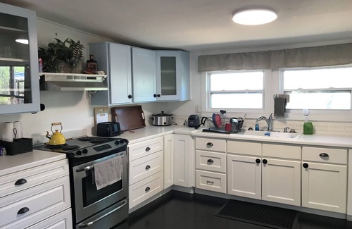 Floral City Cottage | Cottage at Water's Edge 2 Bedroom with dock, covered deck, WiFi, AC