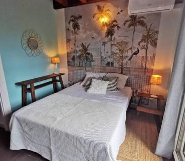 Boucan Canot House | COTTAGE BLUE classé 3 étoiles - 4 à 6 personnes - 2 chambres - accès direct à la plage et à l'esplanade de Boucan Canot avec ses bars et restaurants