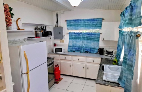 Crown Point Cottage | cottage close at Store Bay in Sandy Point area.