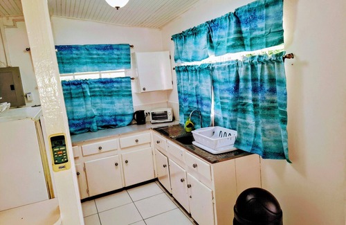 Crown Point Cottage | cottage close at Store Bay in Sandy Point area.