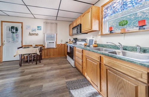 Cuyahoga Falls House | Cottage Living in Cuyahoga Falls: 3 bed, 2 bath w 2 porches, Smart TVs