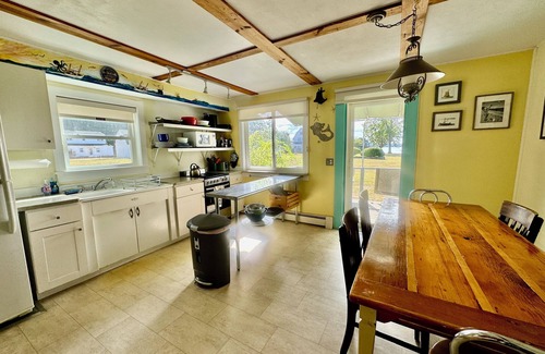 Pipes Cove Cottage | Cottage on Beach front Estate with Dockage .Walk to Village