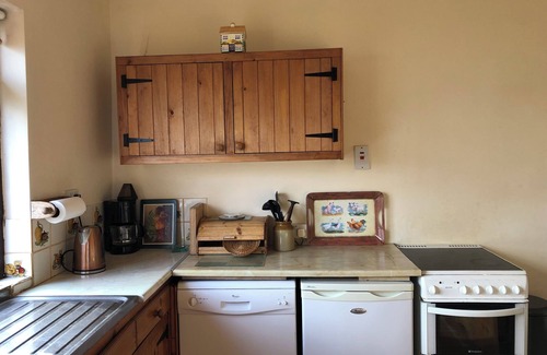 Brandon House | Cottage on Brandon Point on the Dingle Peninsula with sea and mountain views.