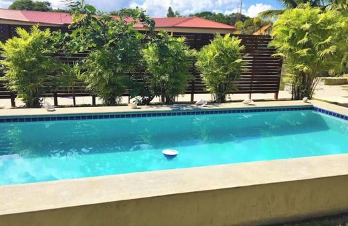 Corozal Cabin | Cottage on the Canal - Pool, Views, Q, Kitchen 35% OFF WHEN USING US CREDIT CARD