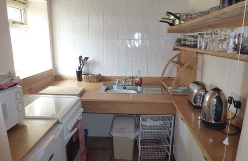 Goveton Cottage | Cottage Sleeps 2 in Bedroom + 2 on sofa bed in sitting room with privacy curtain