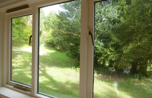 Goveton Cottage | Cottage Sleeps 2 in Bedroom + 2 on sofa bed in sitting room with privacy curtain