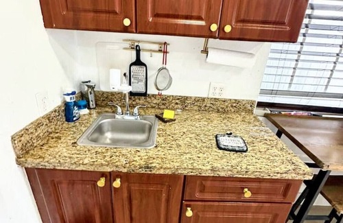 Miami Gardens Condo | Cottage w/Private Firepit, Entrance, Pking & BBQ
