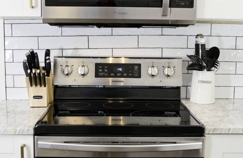 Candler Apartment | Cottage with hot tub, fire pit, game room/theater
